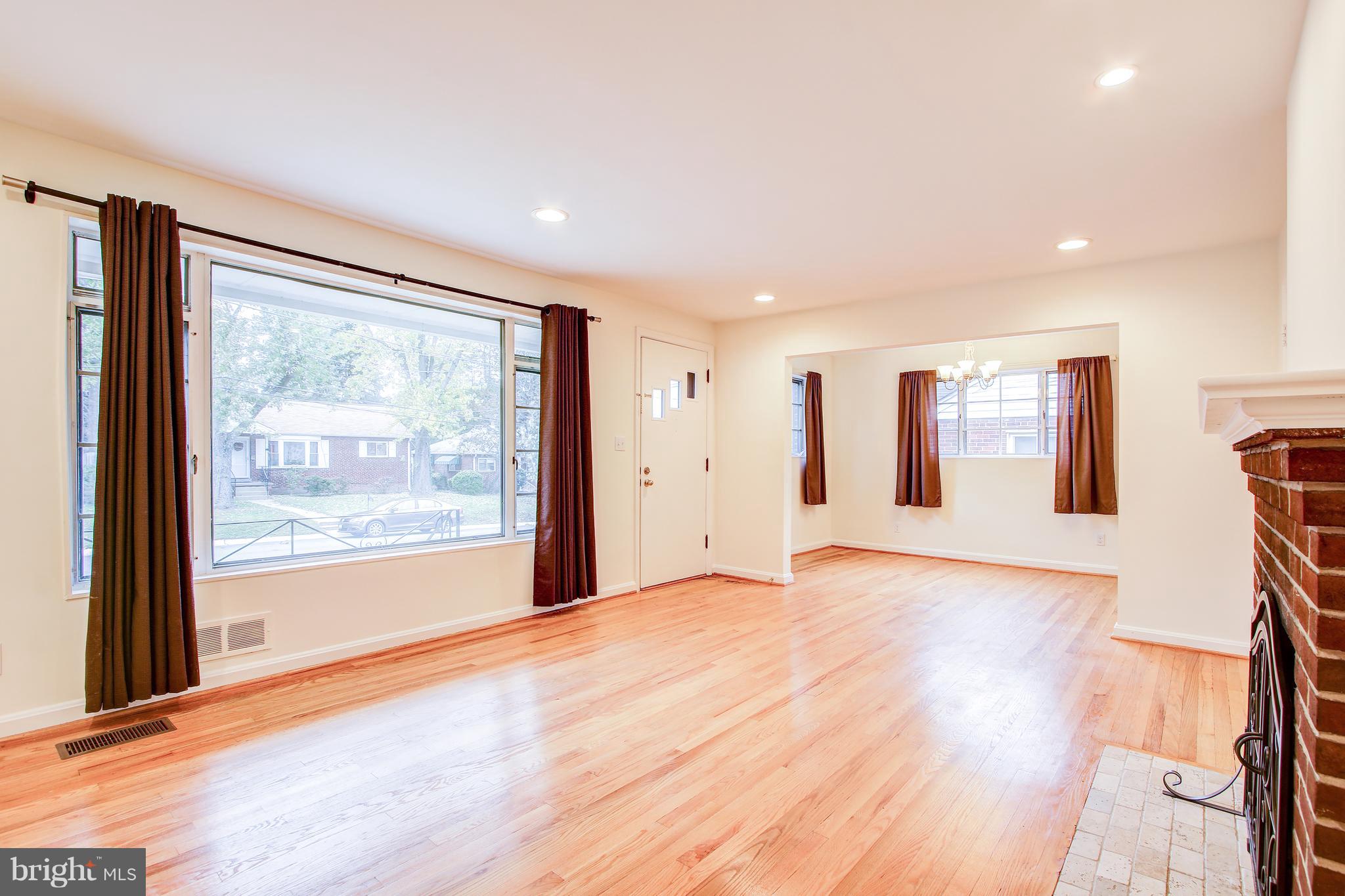 2420 Homestead Drive Silver Spring, MD 20902 - Photo 10 of 31 Living room with sun lite window