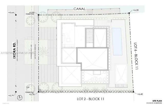 a picture of a bathroom with a window and a white counter