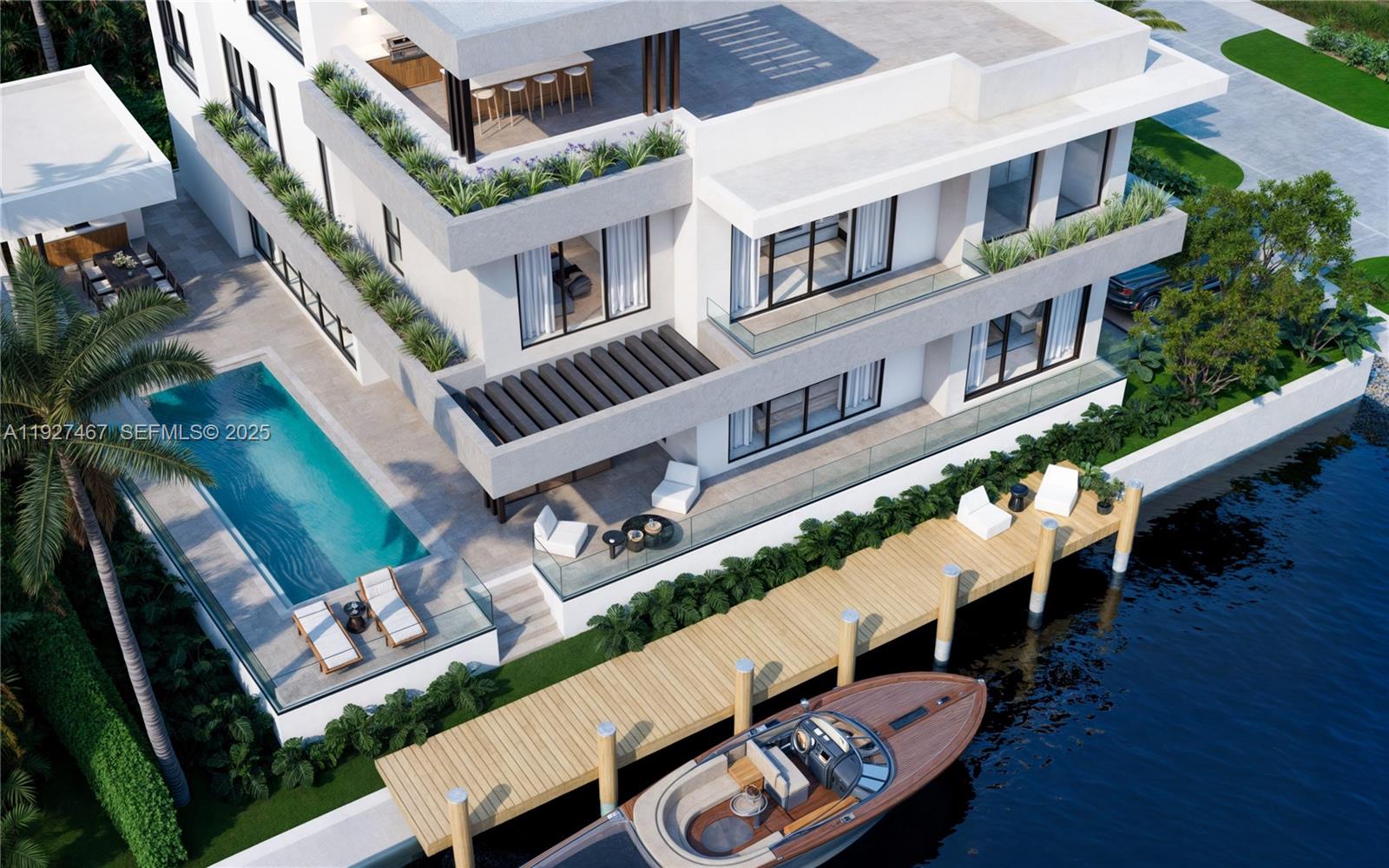 12735 Ixora Road North Miami, FL 33181 - Photo 9 of 21 an aerial view of a house with balcony and outdoor space