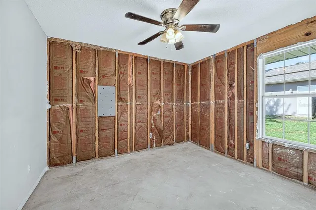 en empty room with fan