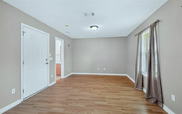a bathroom with a tub and a sink