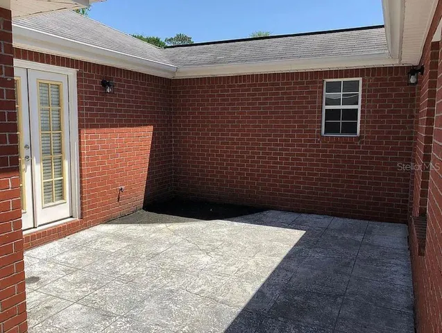 a view of backyard with window