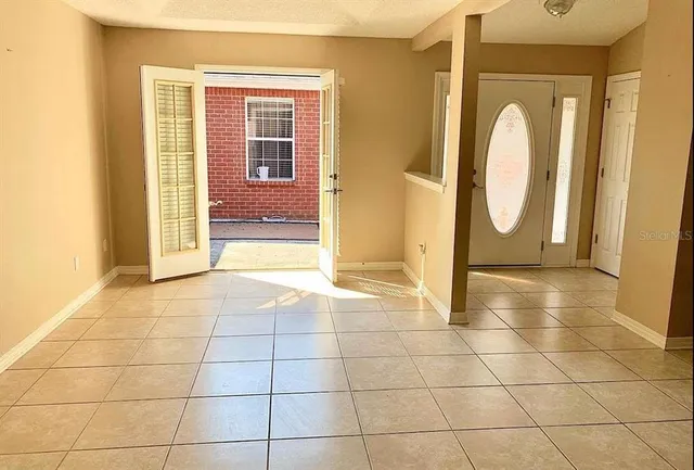 a view of a bathroom with a glass door shower and a bathtub