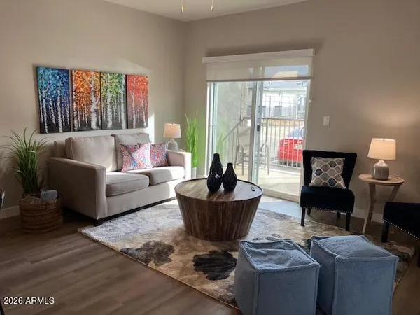 a bedroom with a bed and a mirror