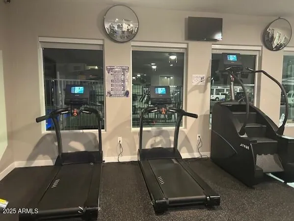 a view of a room with gym equipment