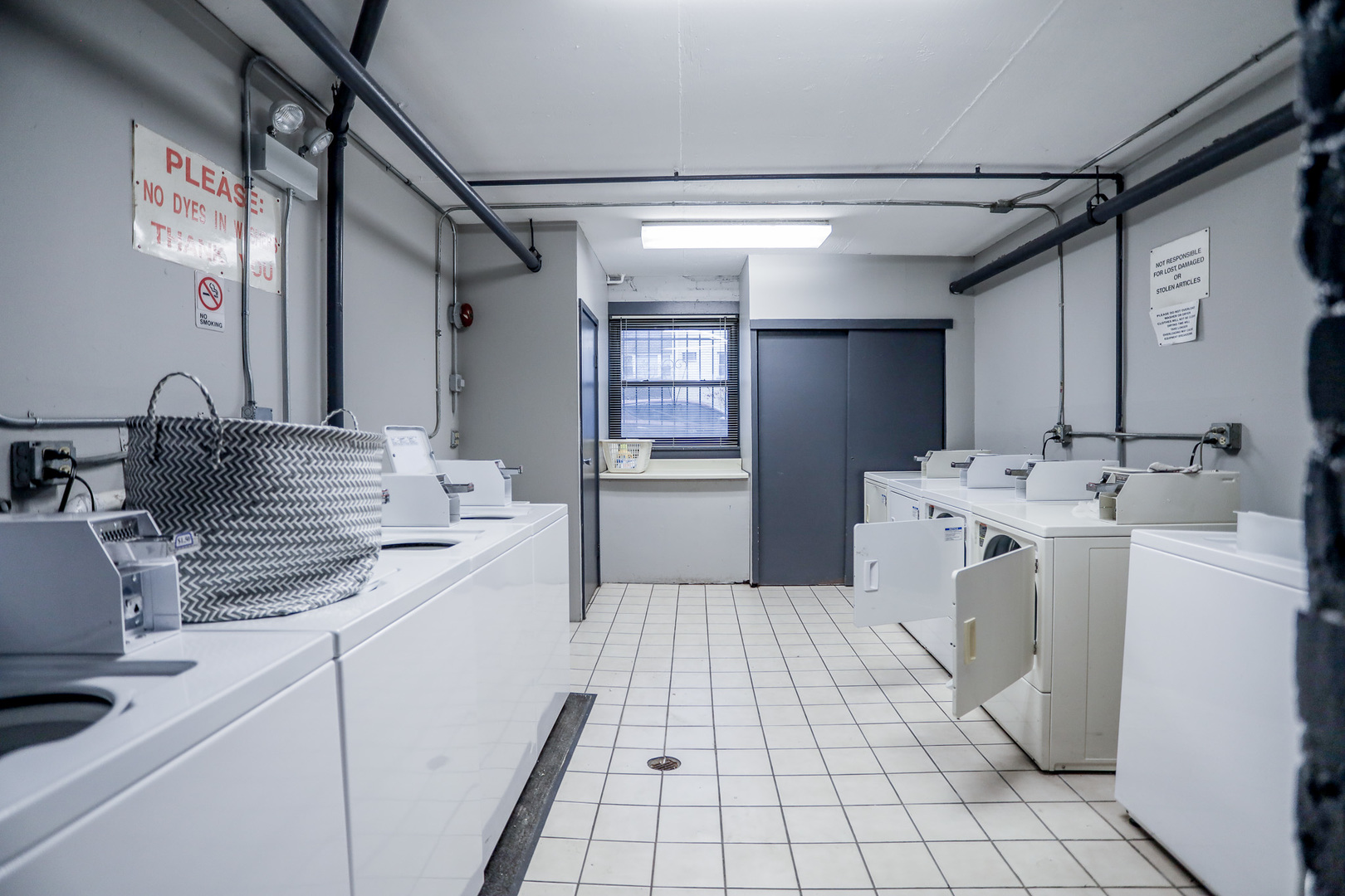 3160 North Cambridge Avenue, Unit 504 Chicago, IL 60657 - Photo 8 of 9 a kitchen with a sink cabinets and appliances