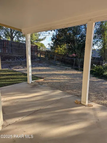 a view of a big room with carpet