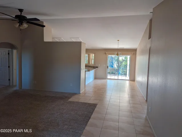 a kitchen with stainless steel appliances granite countertop a sink and a stove