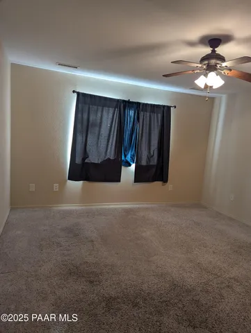 a bathroom with a shower and a toilet