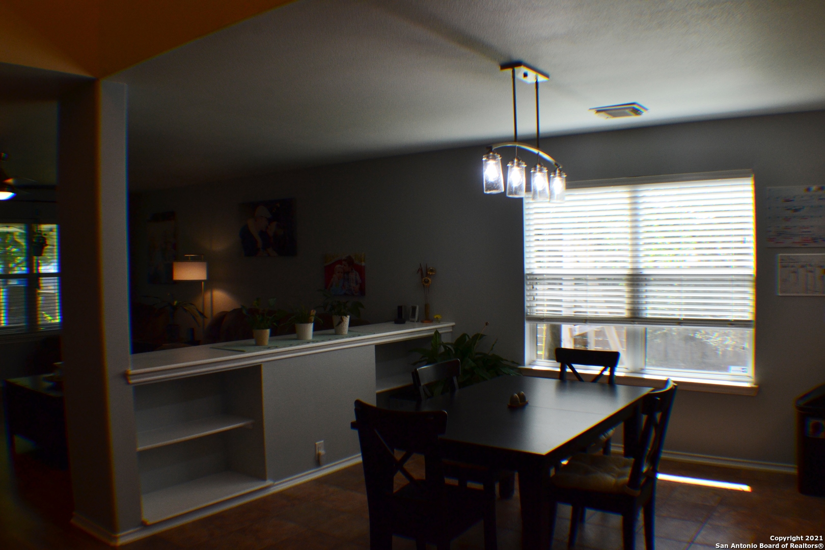 1715 Mountain Brook Schertz, TX 78154 - Photo 13 of 44 a dining room with furniture and window