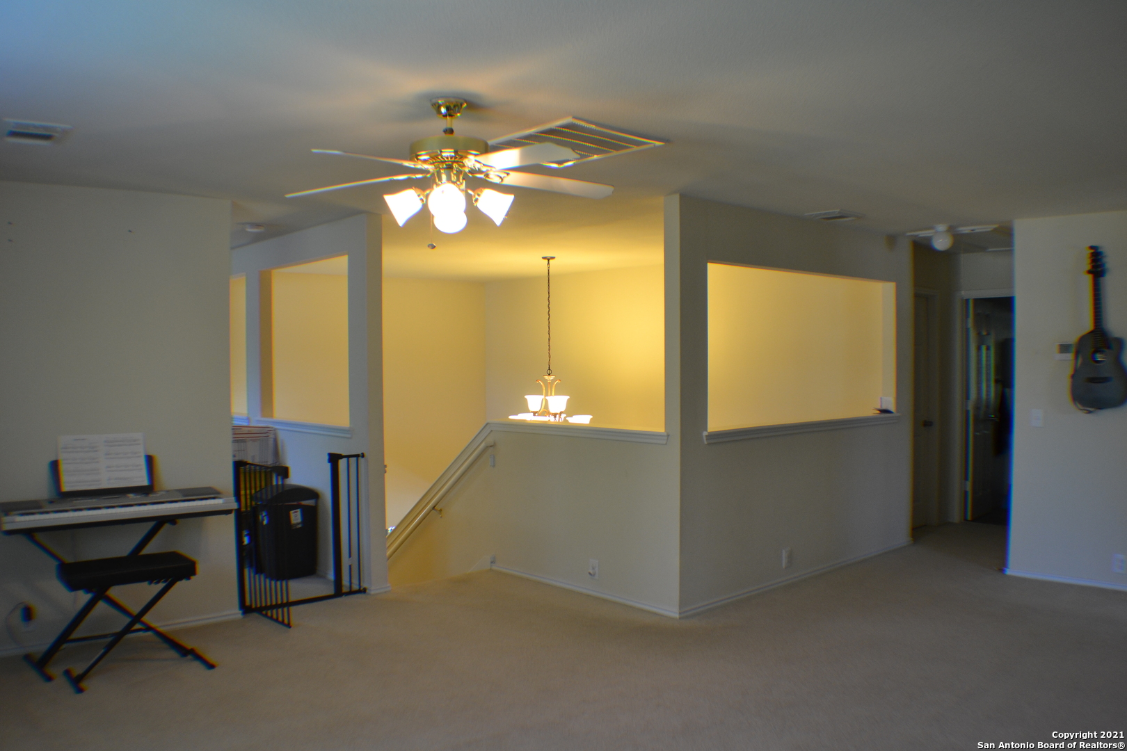 1715 Mountain Brook Schertz, TX 78154 - Photo 21 of 44 a view of a chandelier in a room