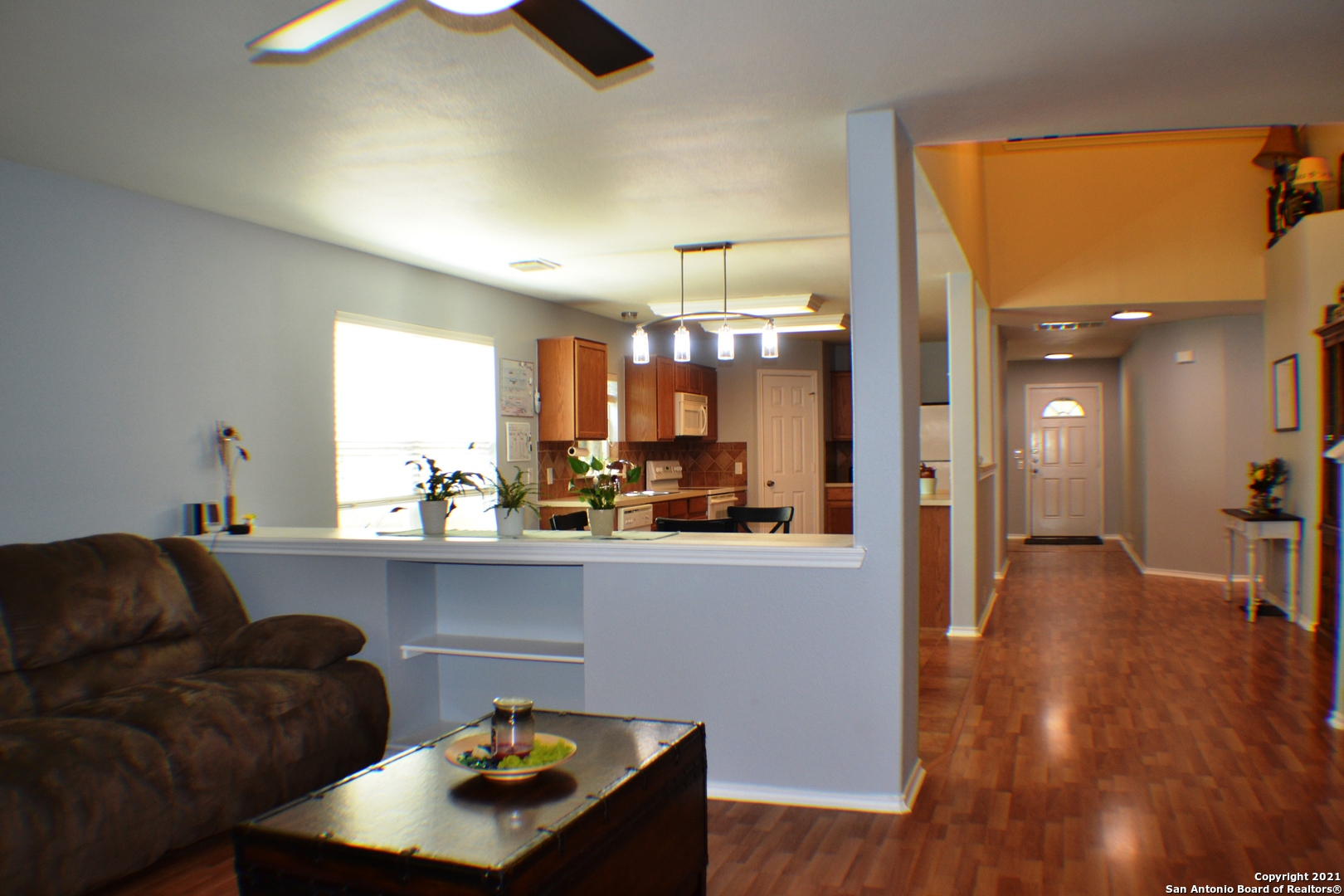 1715 Mountain Brook Schertz, TX 78154 - Photo 28 of 44 a living room with furniture and wooden floor
