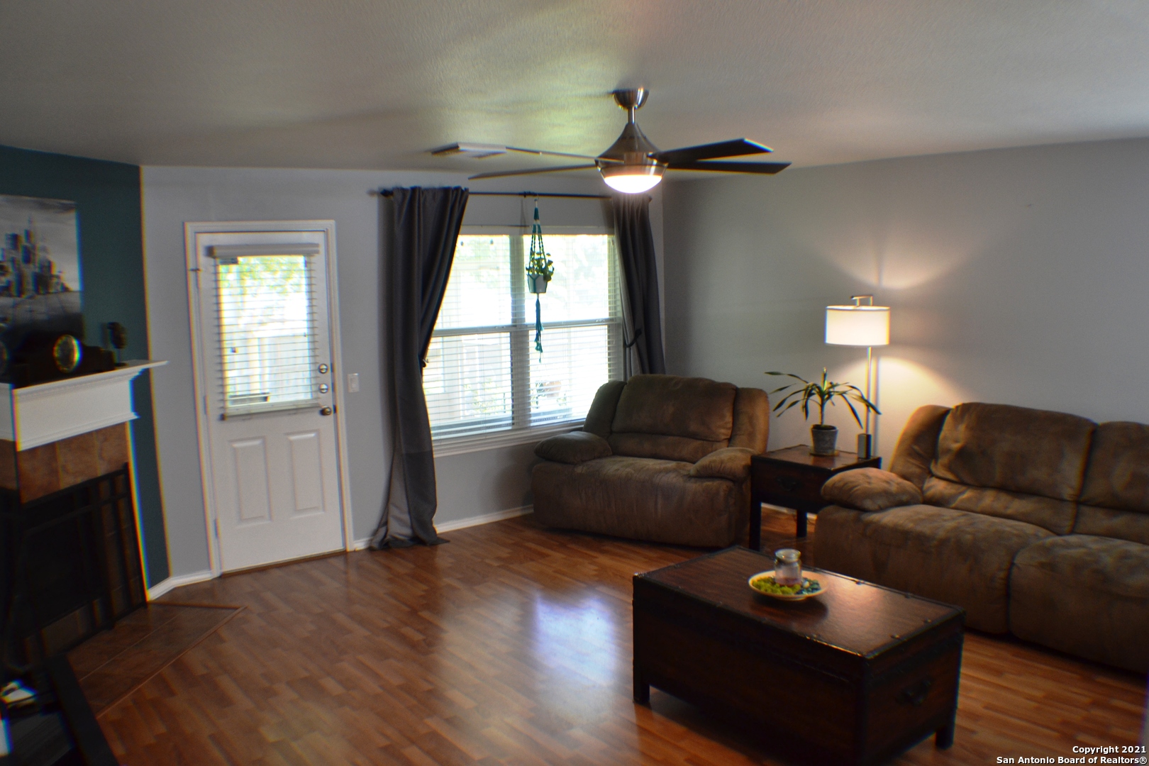1715 Mountain Brook Schertz, TX 78154 - Photo 29 of 44 a living room with furniture and a fireplace