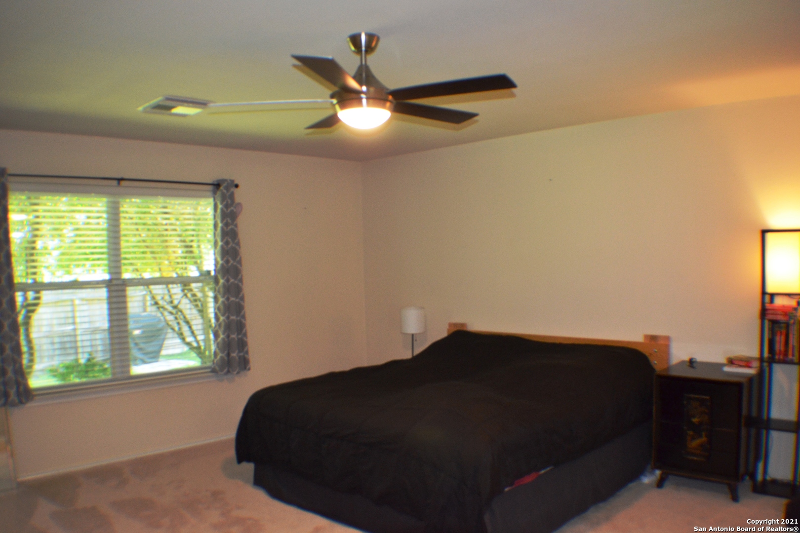 1715 Mountain Brook Schertz, TX 78154 - Photo 31 of 44 a bedroom with a bed and a large window