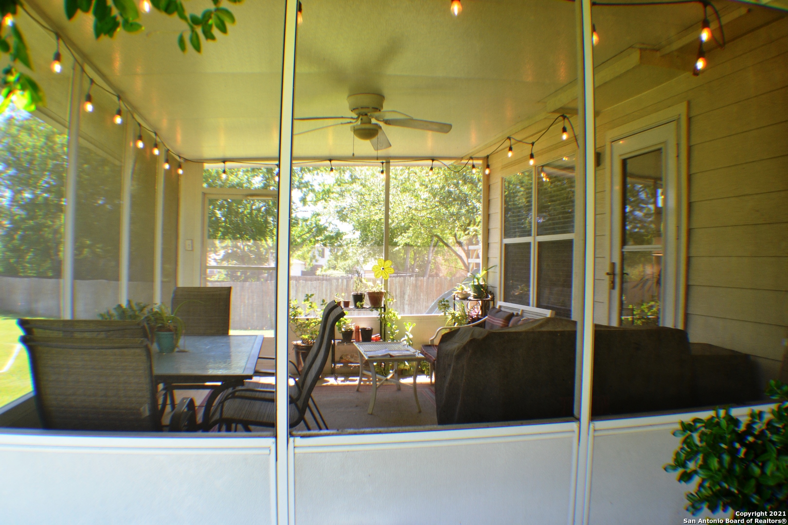 1715 Mountain Brook Schertz, TX 78154 - Photo 42 of 44 a view of living room with furniture and floor to ceiling window