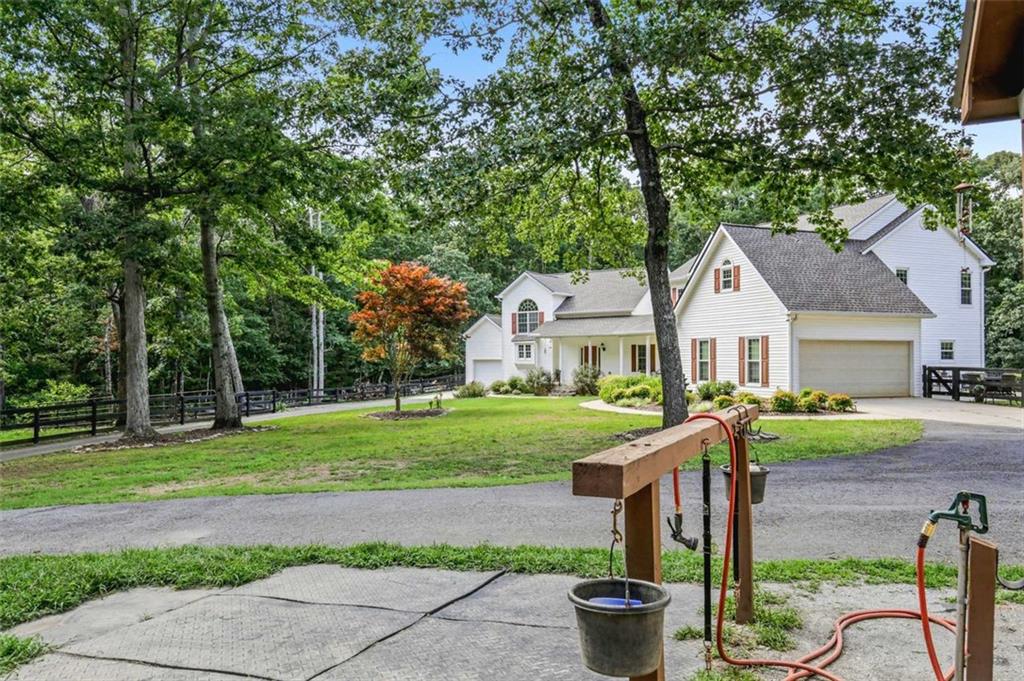 2203 Arbor Hill Road Canton, GA 30115 - Photo 21 of 64 a front view of a house with garden