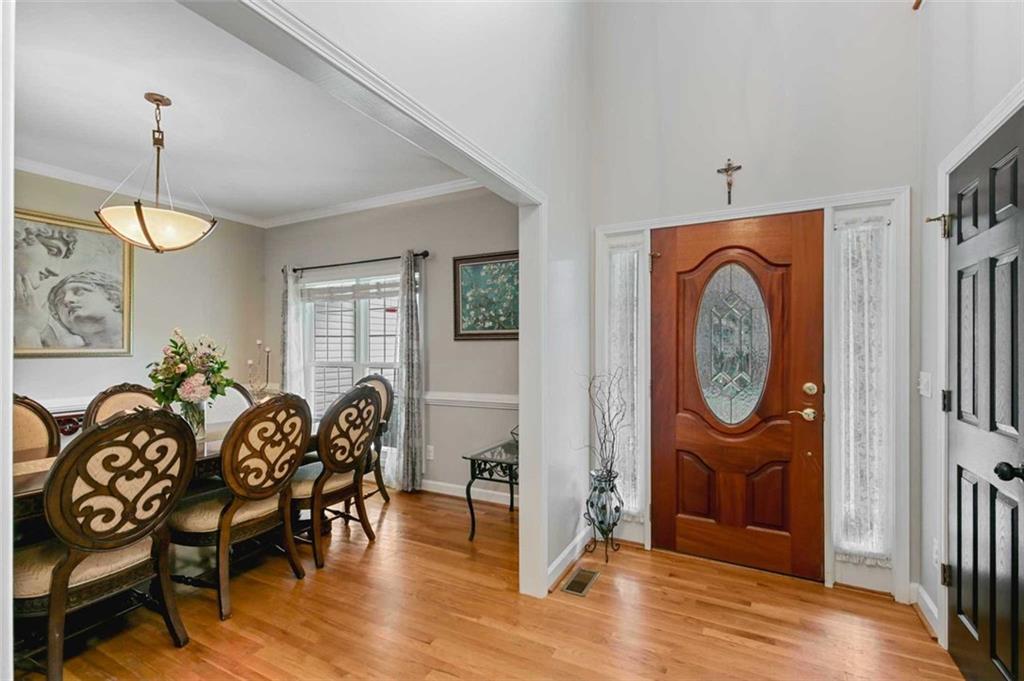 2203 Arbor Hill Road Canton, GA 30115 - Photo 30 of 64 a view of a dining room with furniture window and wooden floor