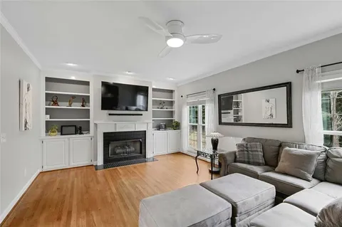 a spacious bathroom with a double vanity sink and a mirror