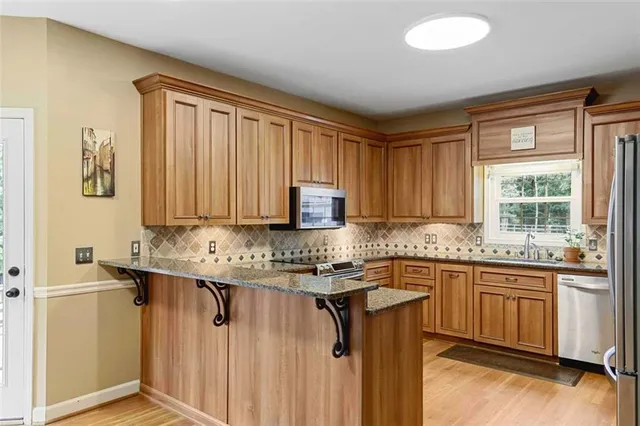 a bedroom with a bed and a ceiling fan