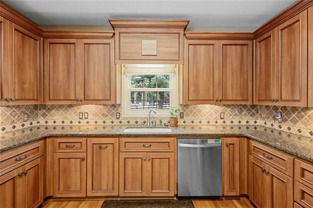 a bedroom with furniture and windows