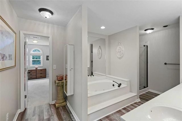 a view of a workspace with furniture