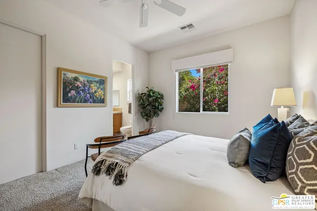 a view of a livingroom with furniture and a table