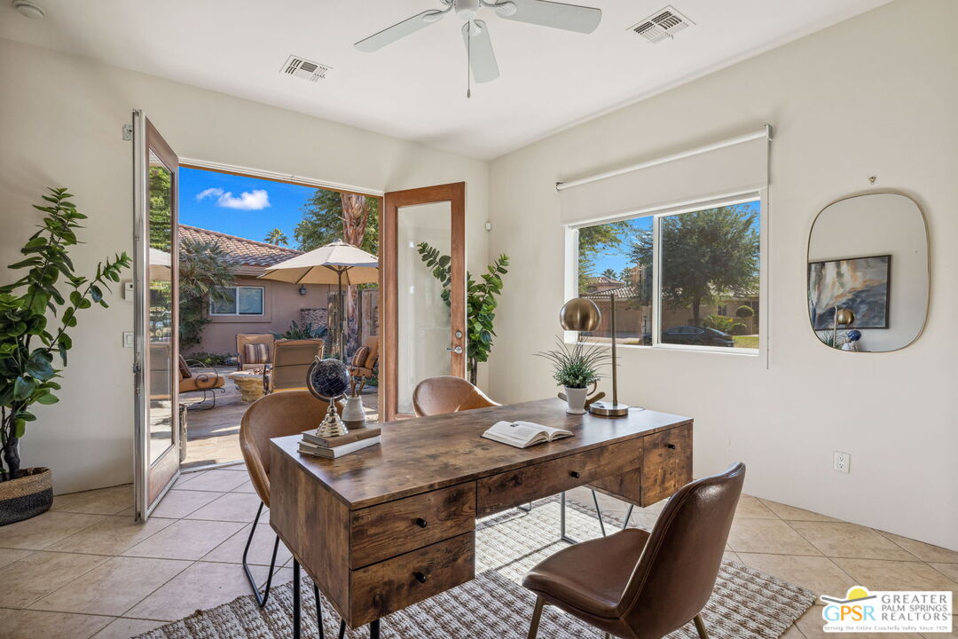 2 Varsity Circle Rancho Mirage, CA 92270 - Photo 56 of 65 a living room with furniture and window