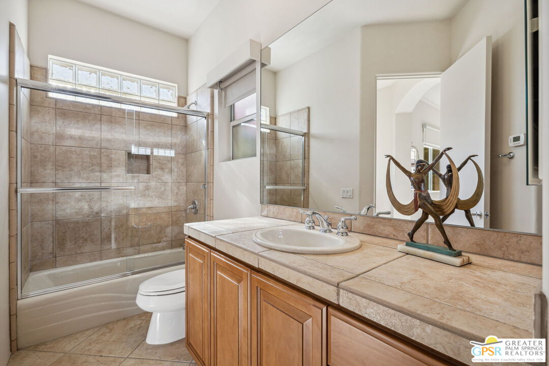 2 Varsity Circle Rancho Mirage, CA 92270 - Photo 59 of 65 a bathroom with a sink toilet and shower