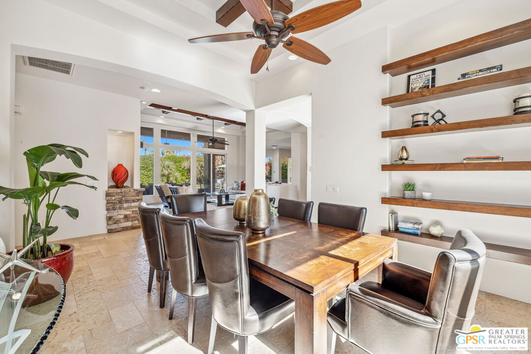 2 Varsity Circle Rancho Mirage, CA 92270 - Photo 9 of 65 a view of a dining room with furniture