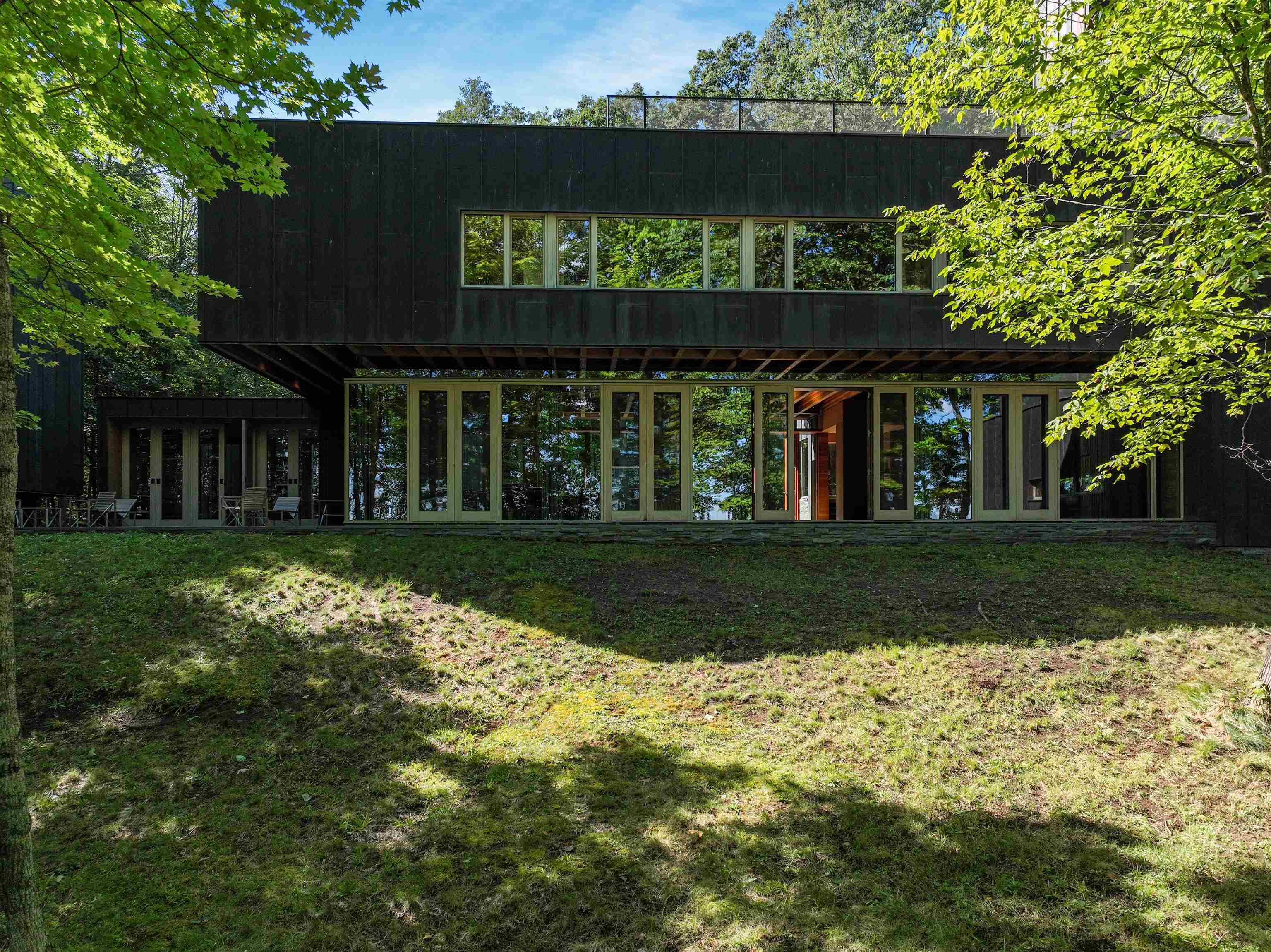 15773 Lake Shore Road Hayward, WI 54843 - Photo 11 of 41 Back of house featuring a yard