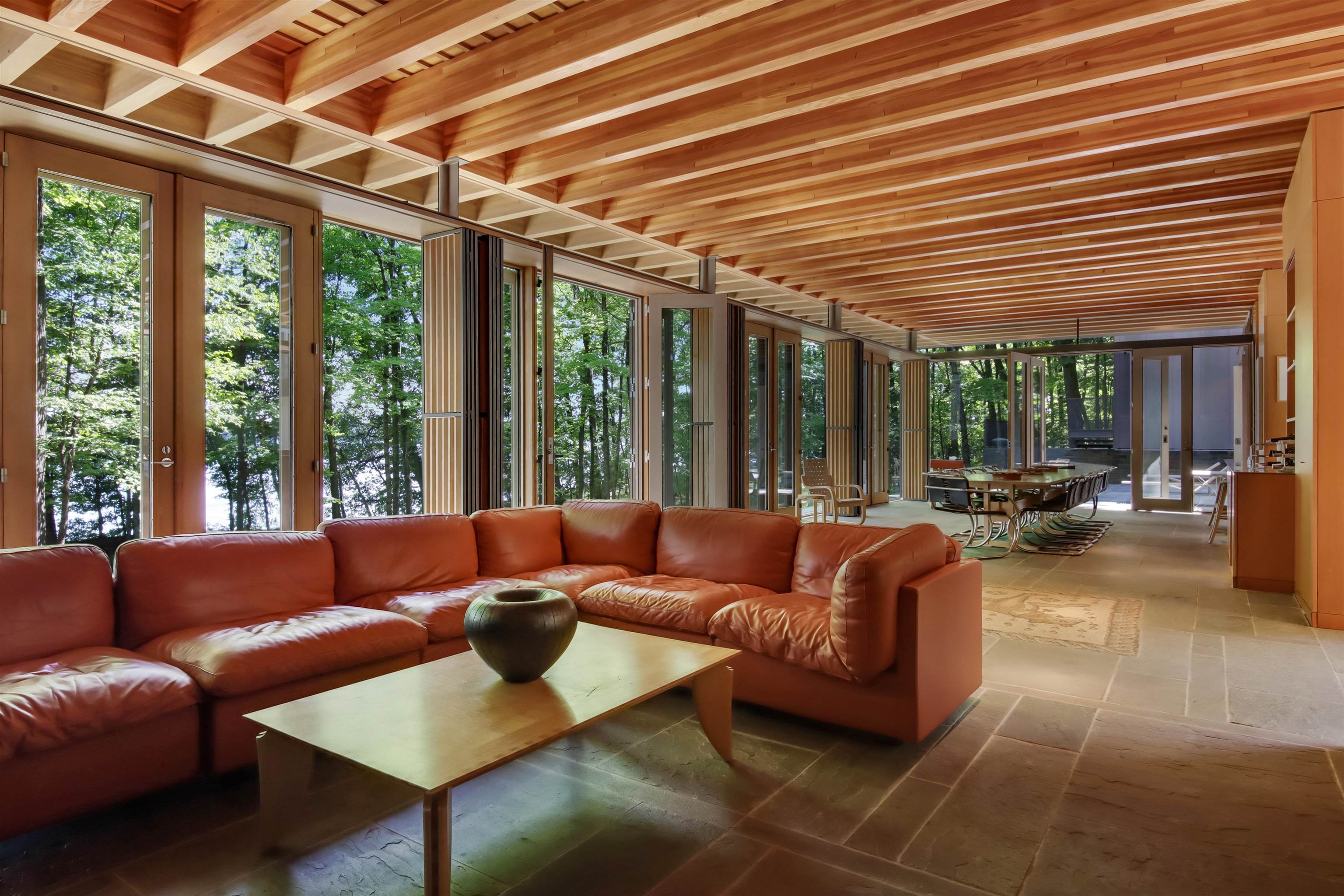 15773 Lake Shore Road Hayward, WI 54843 - Photo 12 of 41 Sunroom with french doors and beamed ceiling