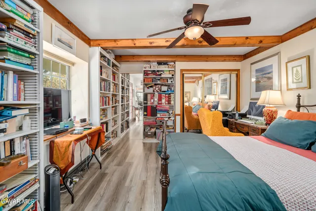 a view of a livingroom with furniture and toys