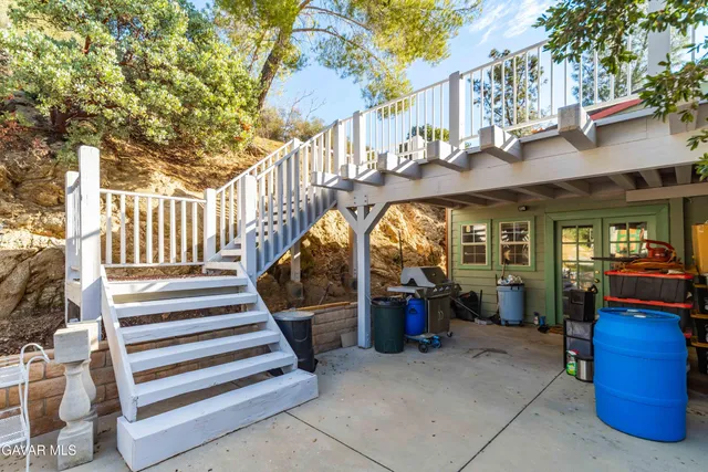 a view of a street with a building in the background