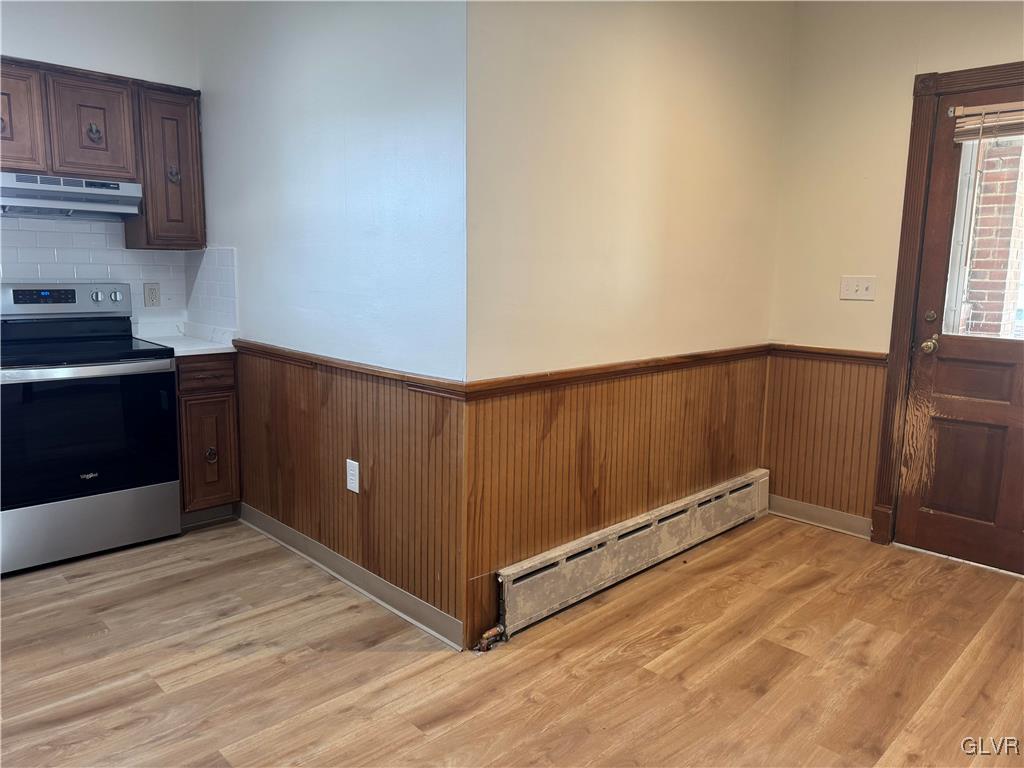 807 Chestnut Street, Unit 1 Coplay, PA 18037 - Photo 15 of 28 a kitchen with wooden cabinets