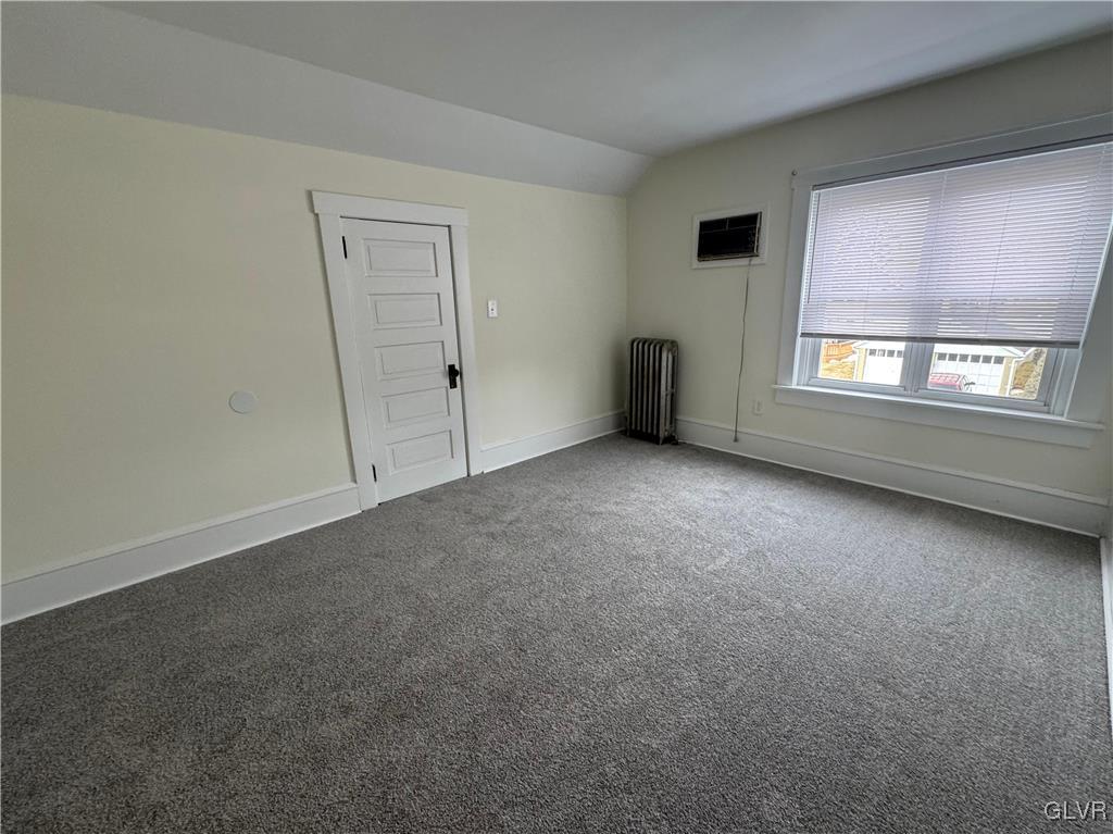 807 Chestnut Street, Unit 1 Coplay, PA 18037 - Photo 18 of 28 an empty room with windows