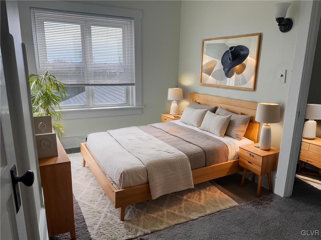 807 Chestnut Street, Unit 1 Coplay, PA 18037 - Photo 21 of 28 a bedroom with a bed and a painting on the wall