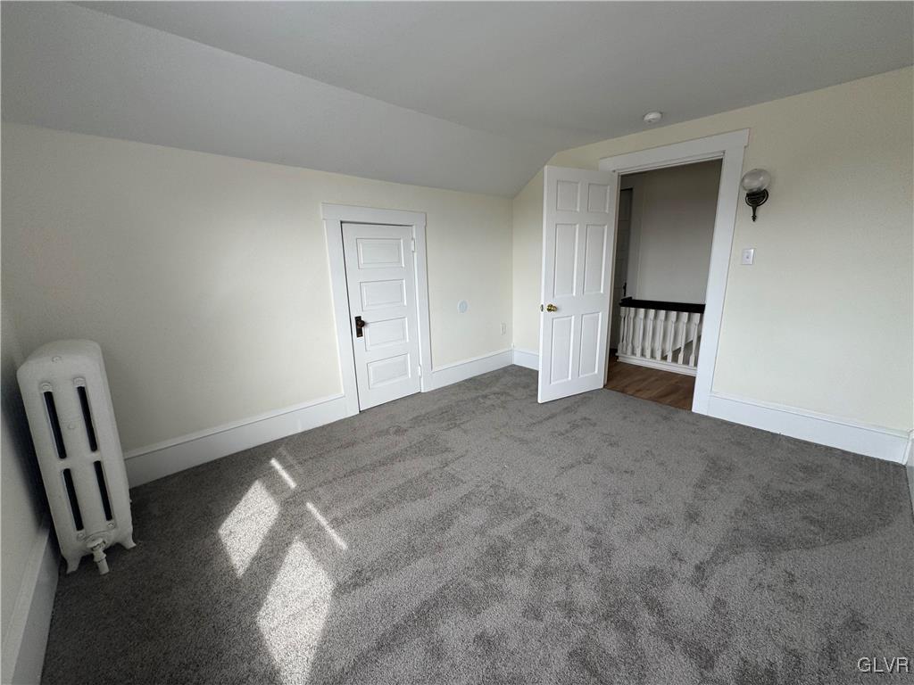 807 Chestnut Street, Unit 1 Coplay, PA 18037 - Photo 25 of 28 a view of an empty room and wooden floor