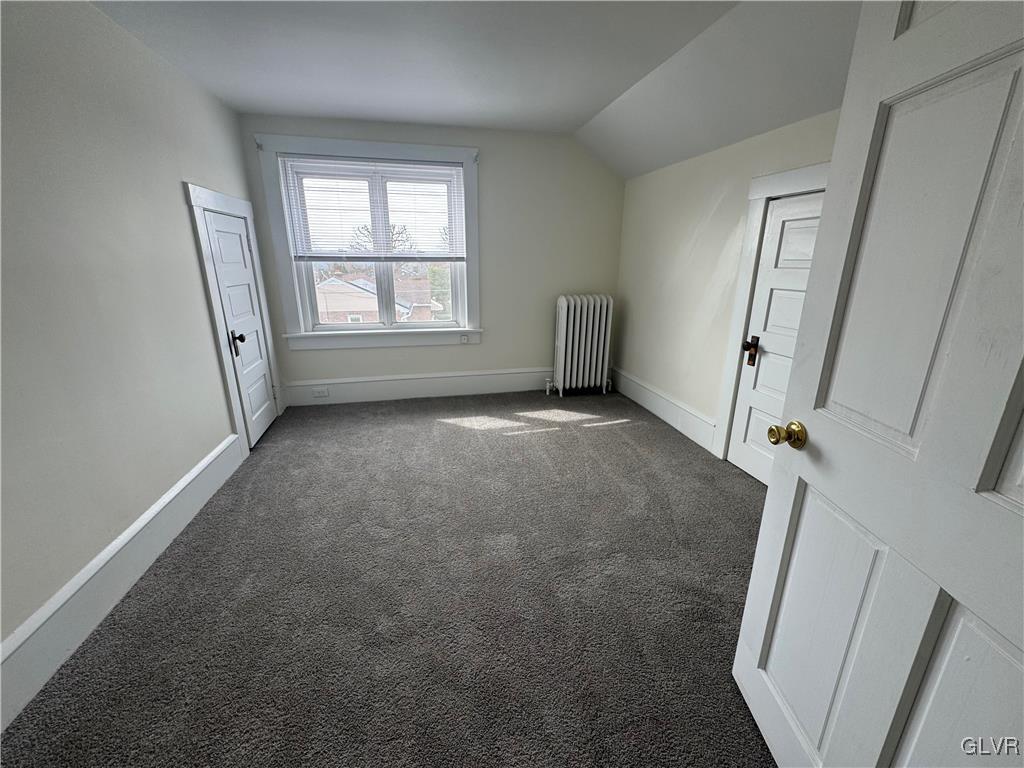 807 Chestnut Street, Unit 1 Coplay, PA 18037 - Photo 26 of 28 an empty room with windows and closet