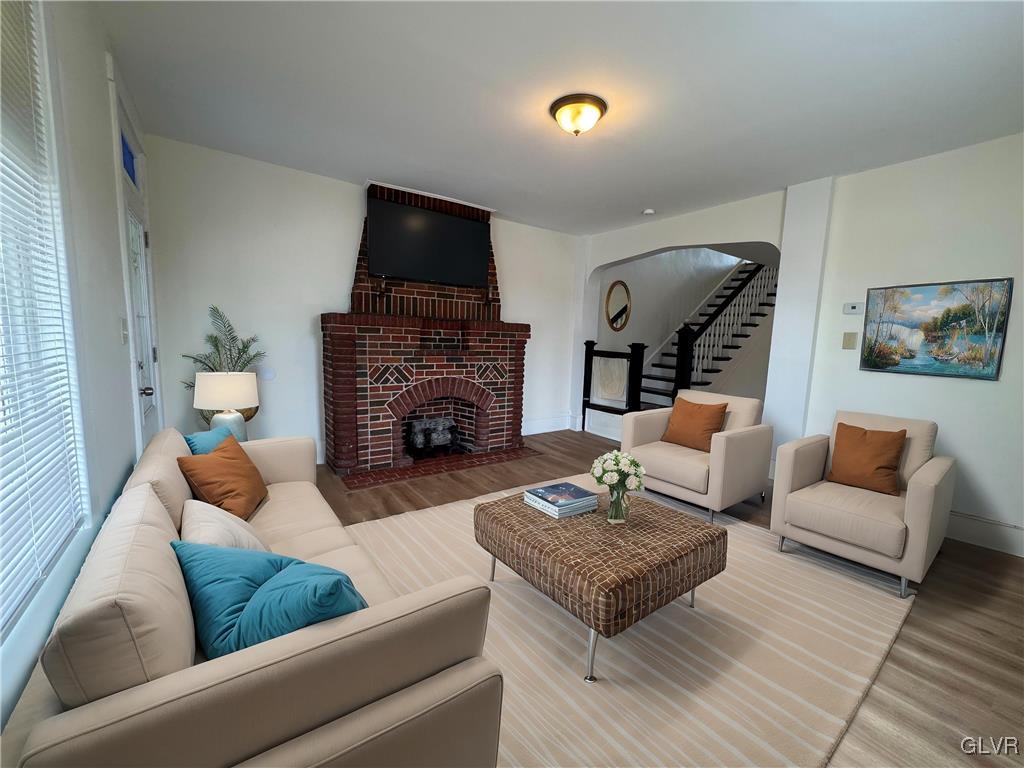 807 Chestnut Street, Unit 1 Coplay, PA 18037 - Photo 5 of 28 a living room with furniture and a fireplace