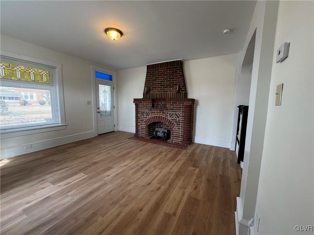 807 Chestnut Street, Unit 1 Coplay, PA 18037 - Photo 8 of 28 a room with furniture and a fireplace