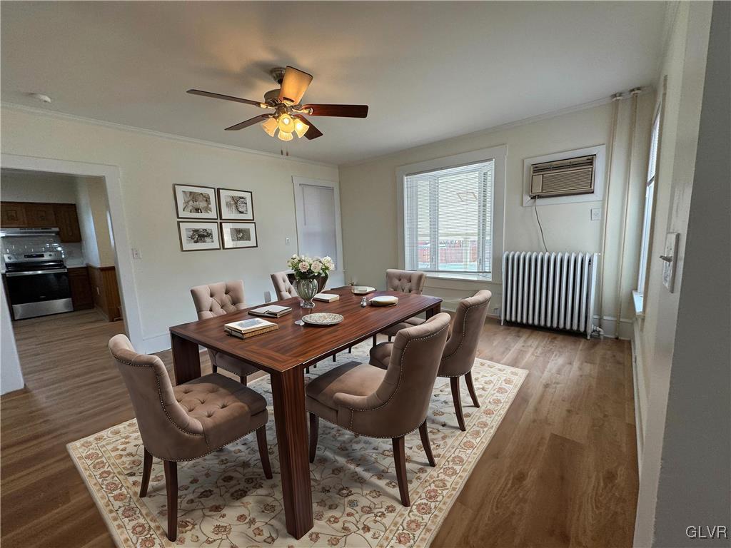 807 Chestnut Street, Unit 1 Coplay, PA 18037 - Photo 10 of 28 a view of a dining room with furniture and wooden floor