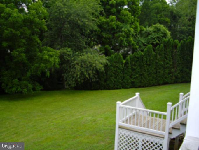 3139 Bayside Road Huntingtown, MD 20639 - Photo 16 of 30 a view of an outdoor space and a yard