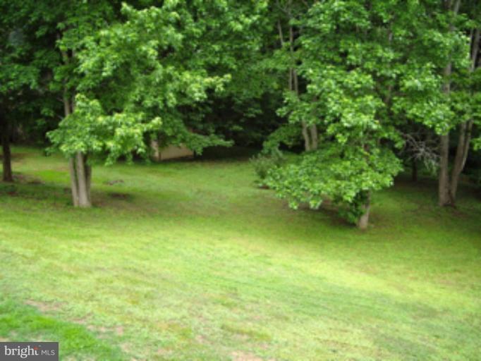 3139 Bayside Road Huntingtown, MD 20639 - Photo 17 of 30 a view of a garden