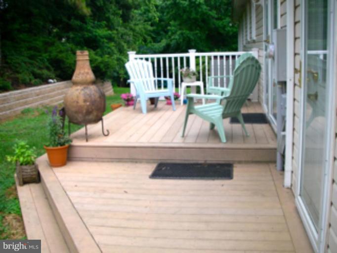 3139 Bayside Road Huntingtown, MD 20639 - Photo 3 of 30 a view of balcony with wooden floor