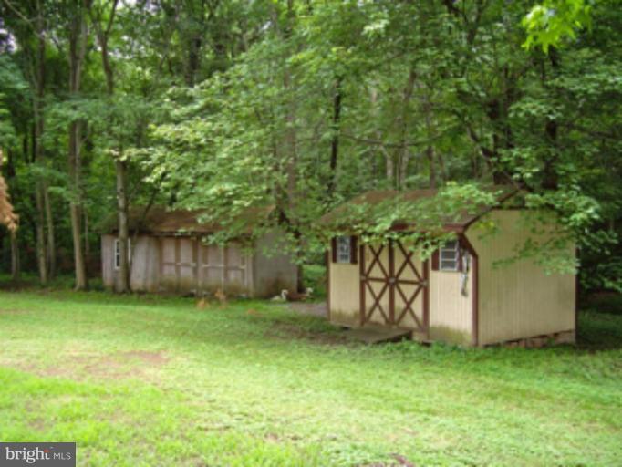 3139 Bayside Road Huntingtown, MD 20639 - Photo 23 of 30 a view of an outdoor space and yard