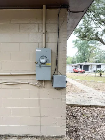 a view of living room with a sink and chandelier