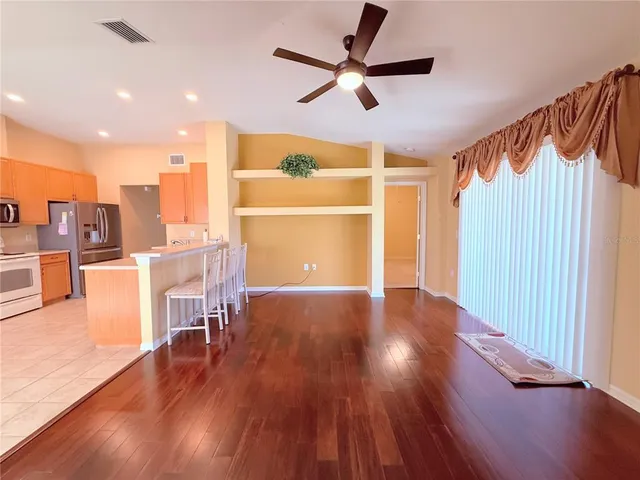 a view of empty room with fan