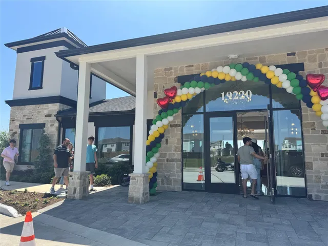 a view of a building with sitting area