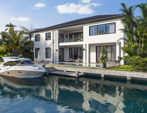a view of house with swimming pool and outdoor seating
