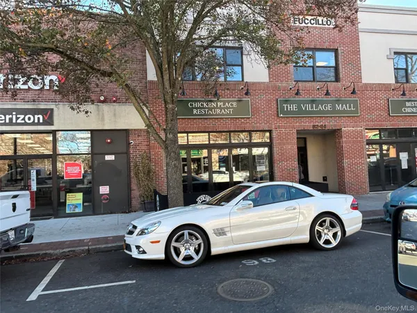 a car parked in front of a building